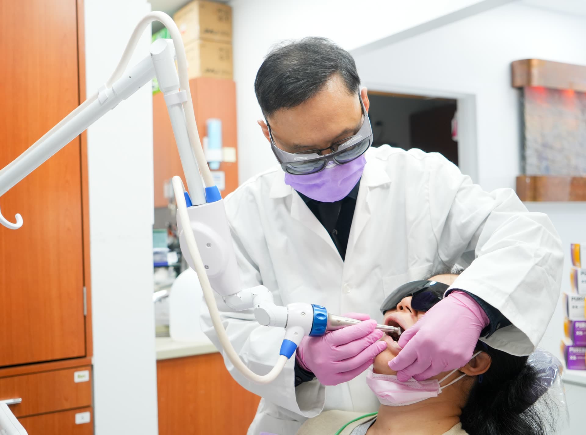 Dr. Shi focused chairside on patient care at Centre Dental NYC — privacy policy