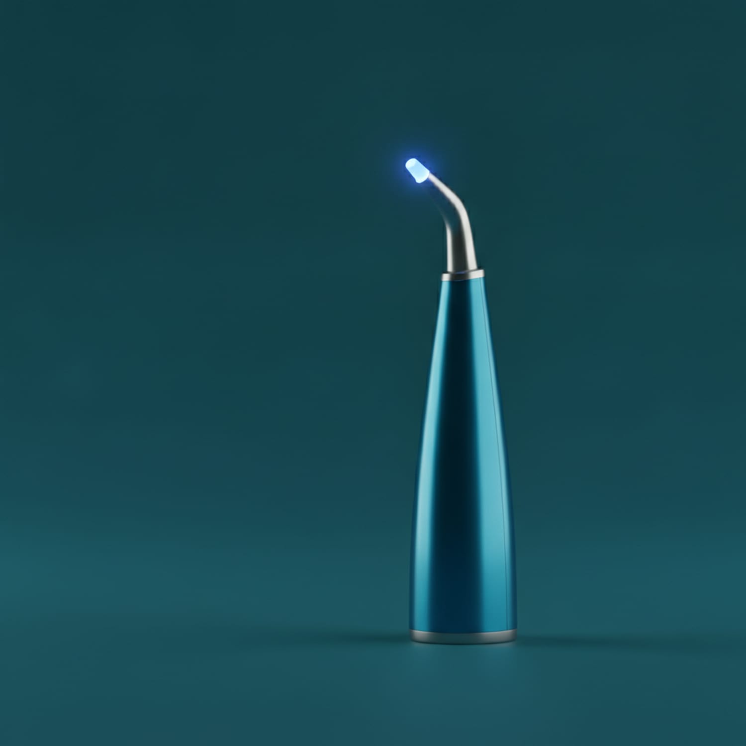 An LED curing light setting a tooth-colored composite filling — Centre Dental NYC